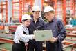 © offsuperphoto - Engineers or workers working on laptop computer and checking product in the metal sheet factory