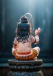 © DWIJ - A child dressed as lord shiva sits in meditation, back view, with water cascading from his hair
