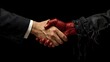 © Sanju - A handshake between a business man and a bloody hand on a black background in a studio setting