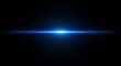 © graphiczone872 - A bright blue lens flare glows against a black background