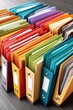 © Georgii - Organized colorful office folders with labels on a modern surface