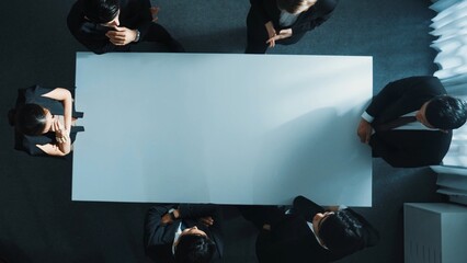 Wall Mural - top down aerial view of smart cooperate businessman discussing about marketing strategy. diverse bus