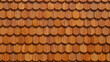 © AbstractZone - Detail of a traditional wooden shingle roof with warm color tones providing rustic charm and weather protection
