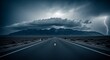 © Sheraz - Long road ahead landscape photography with storm clouds and lightning strikes travel and adventure scenic view