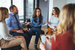 © Dragana Gordic - Group Discussion With Mixed Emotions in a Modern Office