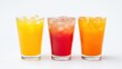 © NashEmpire - Three Colorful Beverage Glasses with Ice on White Background
