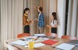 © Charlie's - group of business people LGBTQ+ Diverse Team meeting collaborating new project in office