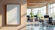 © MDBAKHTIAR - Blank framed poster on wall next to modern office interior
