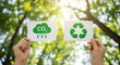 © MAMUNURRASHID - Reducing carbon emissions and recycling symbols for a sustainable environment