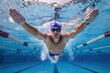© Huu da - Male swimmer underwater , swimmer in swimming pool
