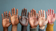 © MuhammadUmer - Diverse hands together unity and inclusion concept for racial equality and harmony in community group