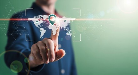 Wall Mural - A persons finger touching a digital world map with location pins, representing global connectivity and technological advancement
