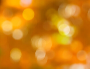 Wall Mural - Orange abstract background blur with bokeh lights