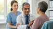 © MT - Caring Indian male doctor uses a stethoscope for a check-up on an elderly female patient. A smiling Asian nurse looks on in the hospital office.
