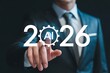 © Creative Mahdi - Businessman touching A I gear symbol with 2026 text artificial intelligence technology