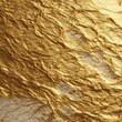 © Tarakan - Textured gold surface with subtle creases and muted beige accents