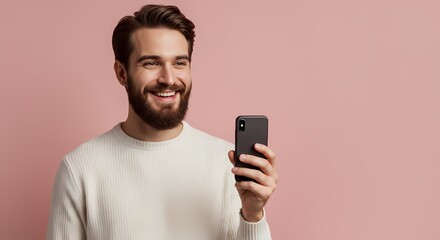 smiling man using smartphone