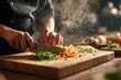 © Daniel DS job - Chef Chopping Vegetables on Wooden Board