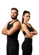 © mohammed - A strong athletic man and woman team pose confidently as personal trainers, isolated as a Background Transparent PNG for gym marketing.