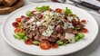 © VRVisionary - Tender veal slices paired with romaine lettuce and parmesan cheese salad