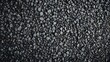 © NeuralNiche - Construction-grade gray granite gravel crushed rock, macadam scree texture ground layer. Aggregated loose rock fragments for building.