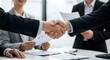 © KHALIED - Business Partnership Agreement, Professional Handshake Moment, Successful Deal Closing, Teamwork and Collaboration, Trust in Business Relationships.