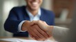 © WS Studio 1985 - Handshake of Deal: A close-up shot of a firm handshake between two professionals, symbolizing a successful business deal or agreement. The image conveys trust, collaboration, and partnership.