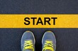 © Lamaba - Start line concept with running shoes for motivation and beginning new journey or challenge