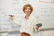 © Rido - Confident professor explaining formula during lesson