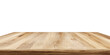 © zarfan - A close-up view of a light-brown wooden tabletop against a black background