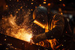 © Svetlana - Dramatic welding scene in dark workshop with intense sparks and focused welder