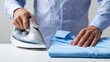 © CStock - A person ironing a blue shirt, showcasing the art of garment care and attention to detail in everyday tasks.