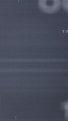 Wall Mural - binary code and numbers animating over dark blue background