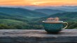 © Dece Std - Teal cup of steaming hot drink on weathered wooden deck, sunset mountain backdrop