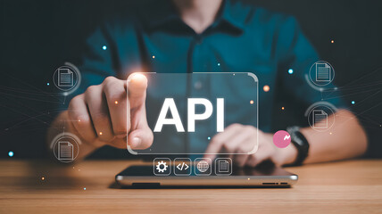businessman interacting with digital interface displaying api technology and data integration concep