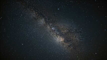 Wall Mural - an impressive night sky photo of the milky way taken with extended exposure, highlighting graininess