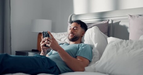 Smile, phone and reading with man in bedroom for social media, text message update and relax. Online news notification, morning and network with person in home for communication app and chat