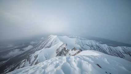 Wall Mural - breathtaking snow-covered summit scene on a cloudy early day