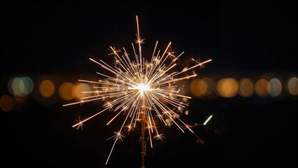 Wall Mural - Vibrant and glowing fireworks illuminating the night with sparkling light effects.