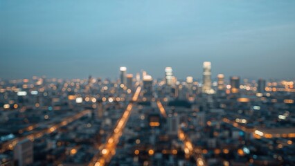 Wall Mural - blurred evening skyline with an abstract city background.