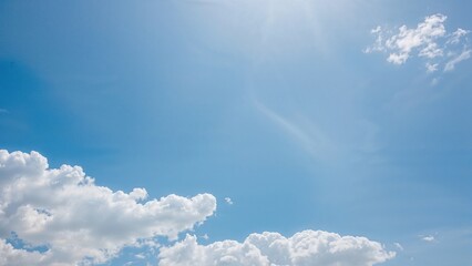 Wall Mural - Bright day with clear blue skies and gentle cloud formations