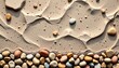 © MakeitEasy - this is an artistic close up photograph showcasing small, round, colored stones arranged to create a pattern resembling a natural pebble shoreline with varying shades of rock