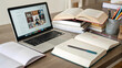© Iza - Online education study setup with laptop books and notes for remote learning and student success