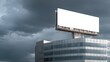 © elenaed - Modern blank billboard on a metallic office building cloudy sky backdrop great for ad concepts