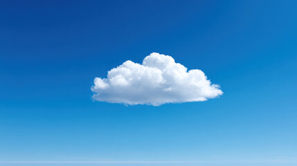 Wall Mural - single isolated white cloud floats peacefully in vast bright blue sky, creating calm and serene atmo