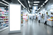 © foto Art - Vertical blank billboard signage in modern pharmacy interior with blurred shelves and medical staff, bright lighting, suitable for health product advertisement or mockup display