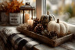 © john - Autumn cozy mood composition on the windowsill. Pumpkins, cones, candles on wooden tray, blurred Fall mood message on lightbox, warm plaid. Autumn, fall, hygge home decor. Selective focus. Copy space.