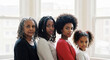 © Colors of Earth Co. - Family of black women standing together at home, mother and kids, symbolizing family unity, cultural strength, motherhood, and intergenerational love