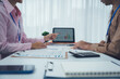 © Wicitr - Businessman team working at office with document on his desk, doing planning analyzing the financial report, business plan investment, finance analysis concept. Economic business discussions.