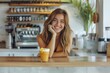 © Dewi - Ultra Quality Picture of Cheerful Woman with Drink Sitting on Counter